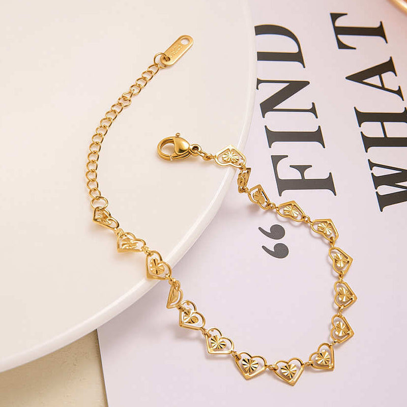 Stralende hartjesketting