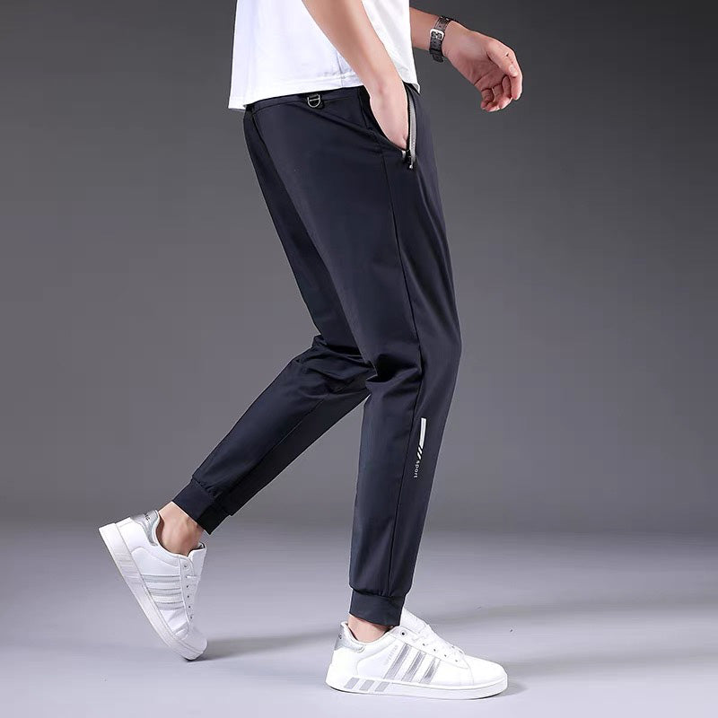 Pantaloni della tuta elasticizzati ad asciugatura rapida da uomo, taglie forti