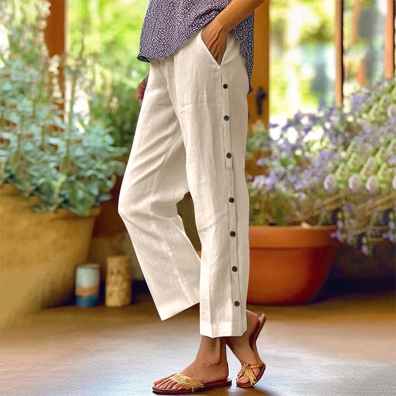 Pantaloni casual cropped dalla vestibilità ampia, a tinta unita, con bottoni laterali
