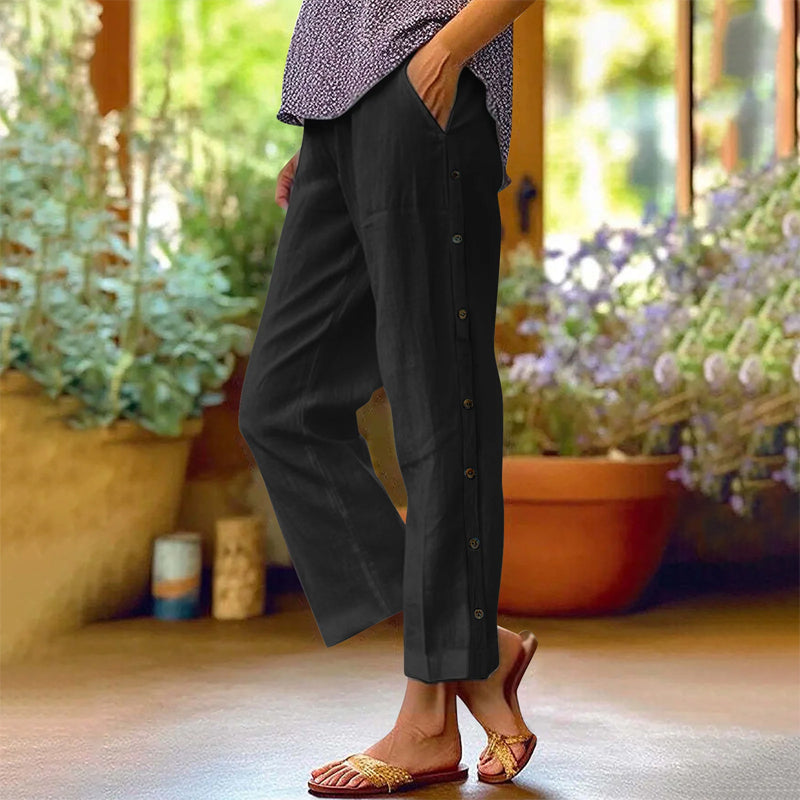 Pantaloni casual cropped dalla vestibilità ampia, a tinta unita, con bottoni laterali