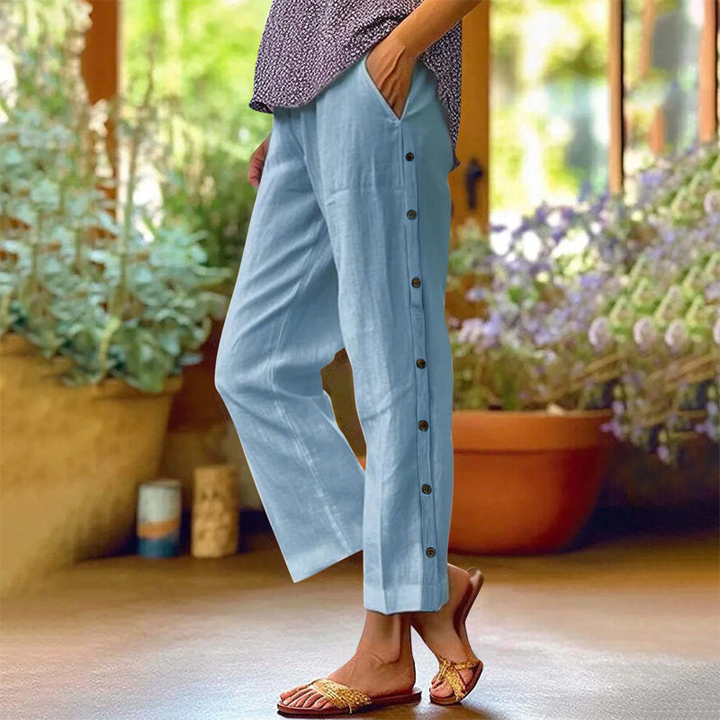 Pantaloni casual cropped dalla vestibilità ampia, a tinta unita, con bottoni laterali