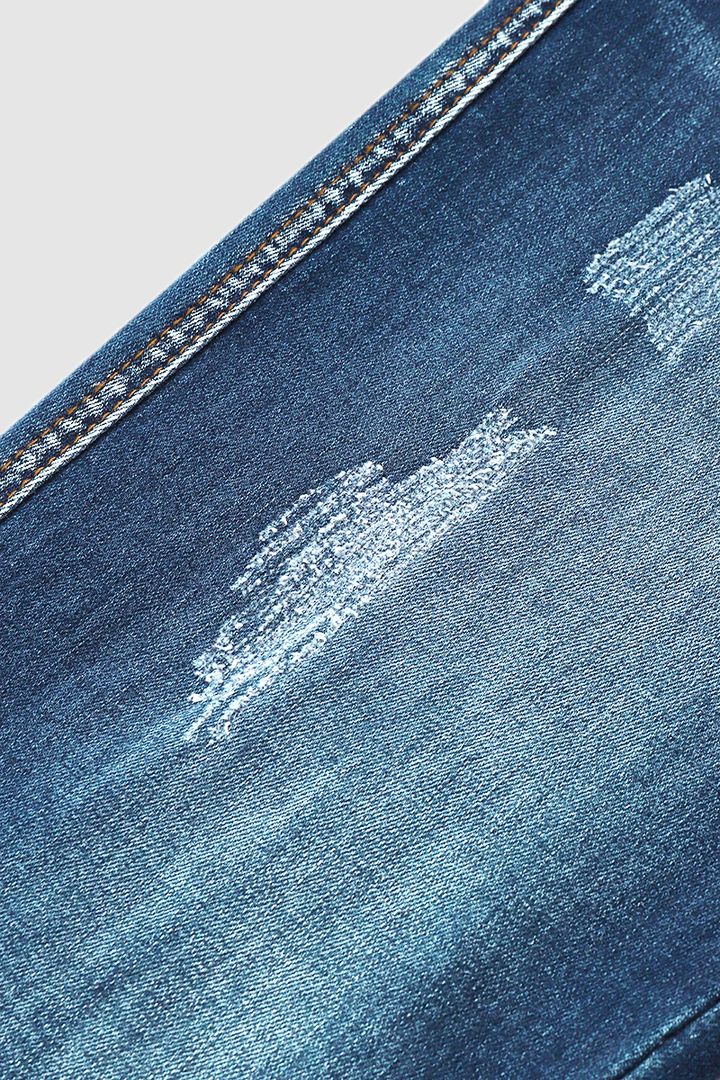 Caprijeans met scheuren en omgeslagen zoom