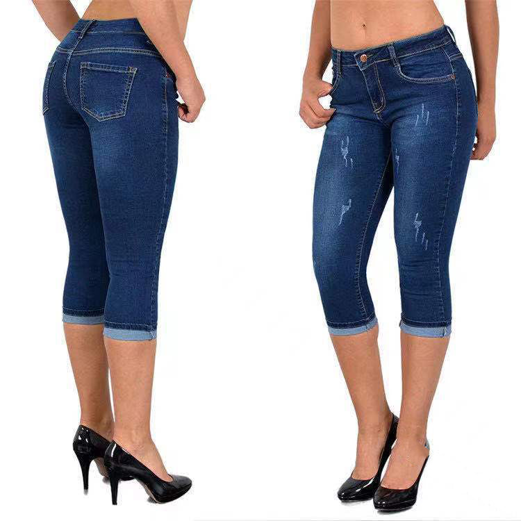 Caprijeans met scheuren en omgeslagen zoom