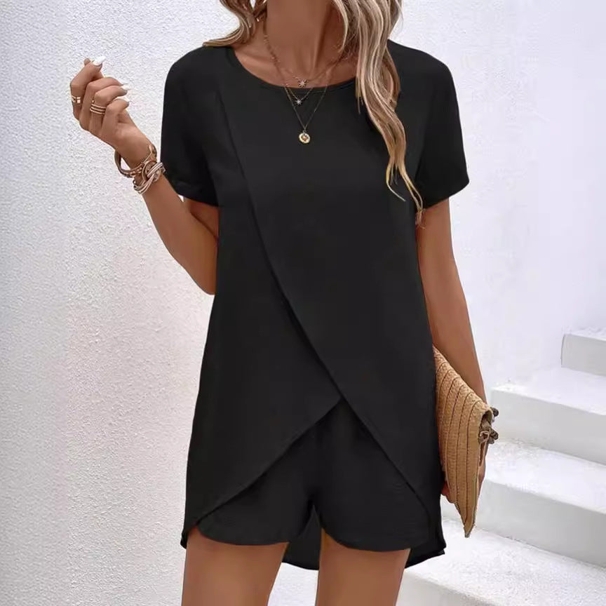 Tweedelige set voor dames met effen top met asymmetrische snit en shorts