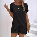 Tweedelige set voor dames met effen top met asymmetrische snit en shorts