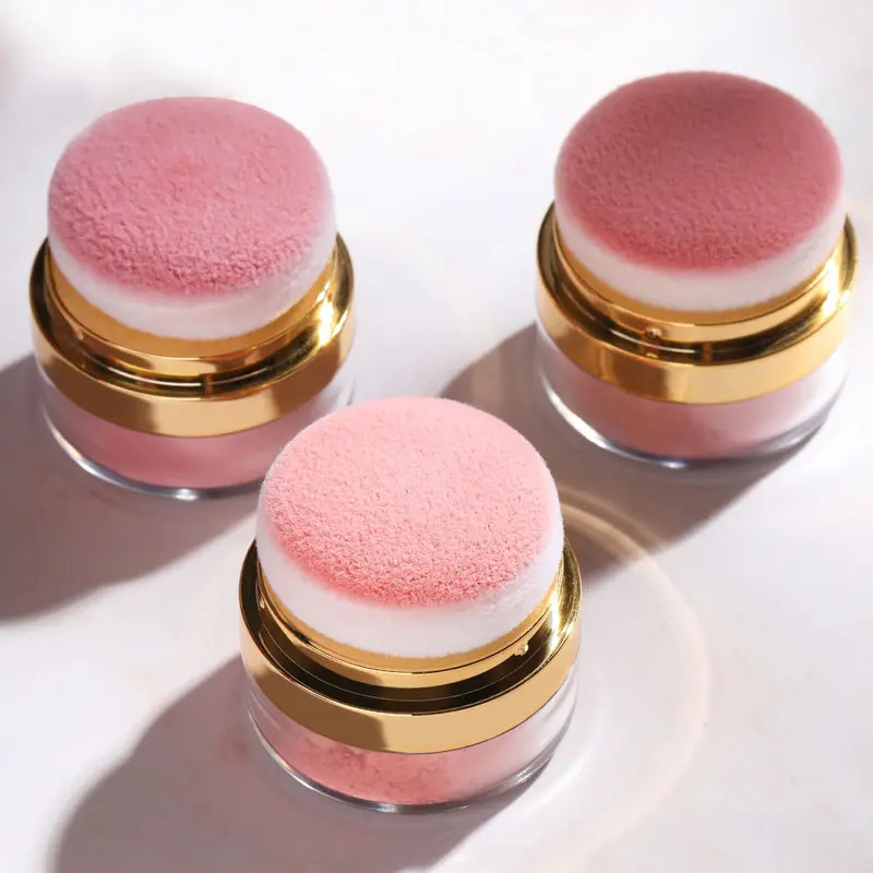 Blush in polvere compatto con applicatore a piumino