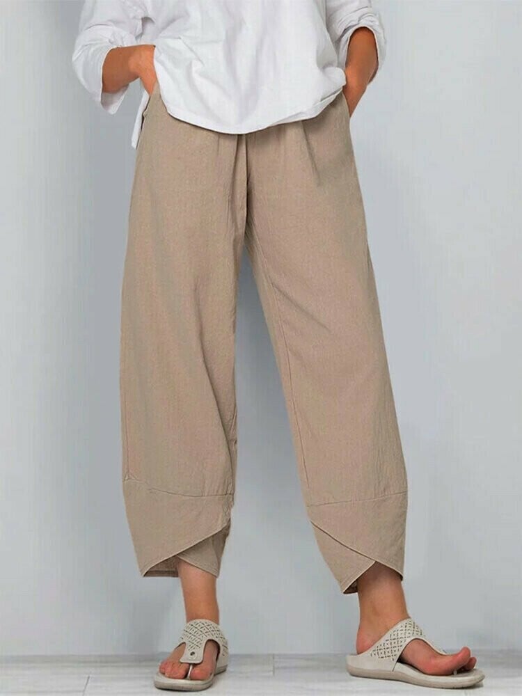 Pantaloni vintage asimmetrici con vita elasticizzata e tasche