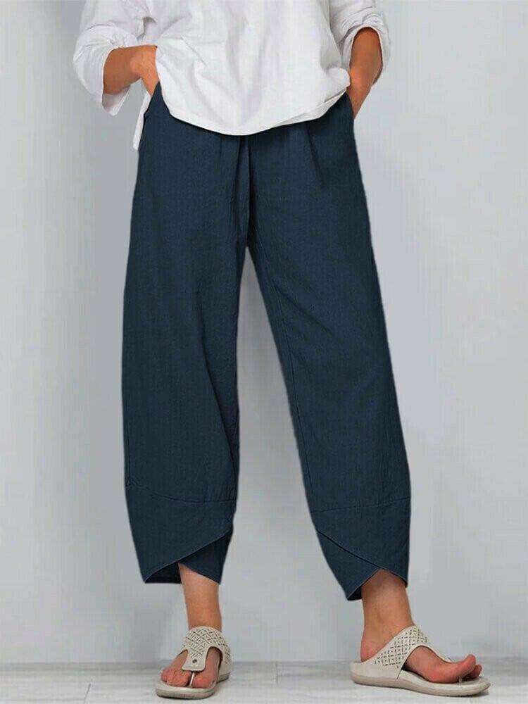 Pantaloni vintage asimmetrici con vita elasticizzata e tasche