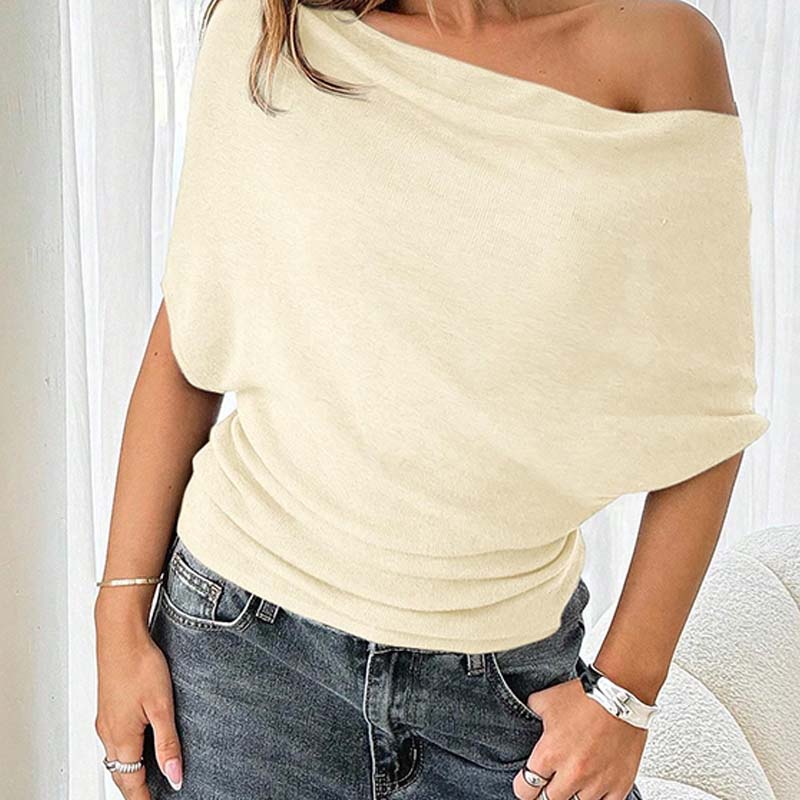 Haut asymétrique pour femme à épaules dénudées et manches chauve-souris