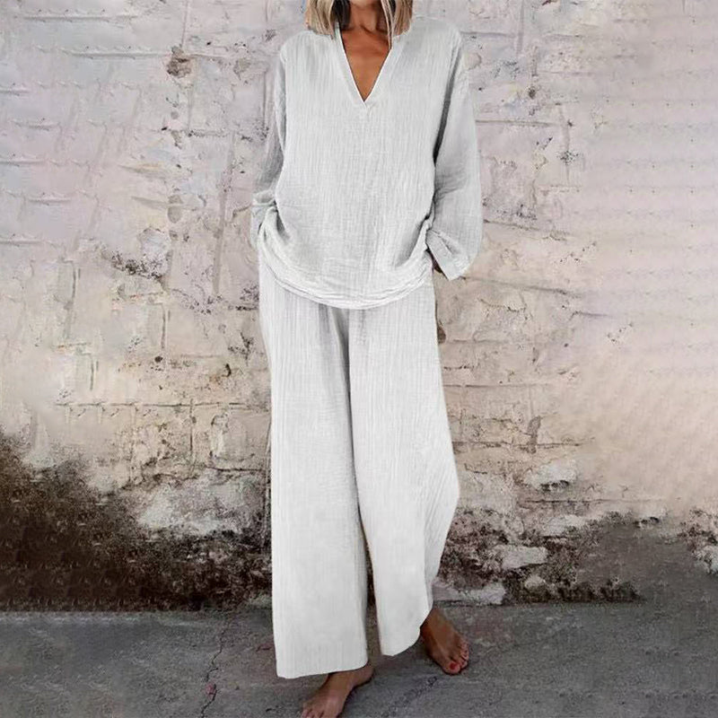 Casual set met effen top met V-hals en lange mouwen en broek met wijde pijpen