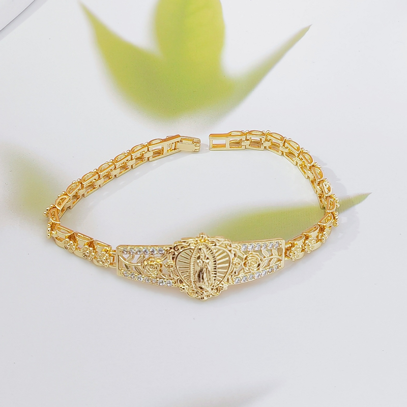 Pulsera elegante de la Virgen María con flores caladas - diseño de filigrana, chapada en oro e inspirada en la fe