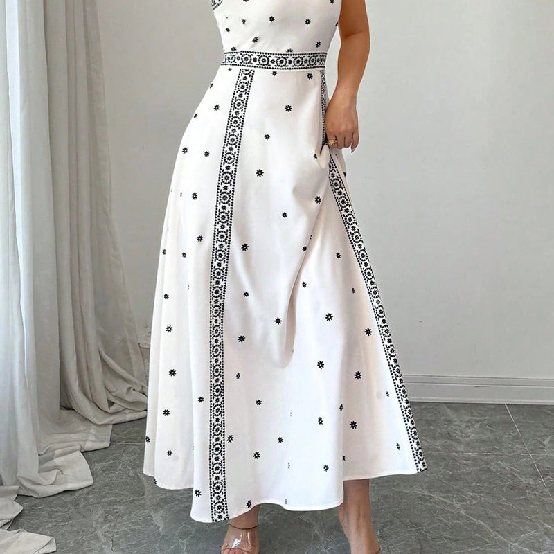 Elegante damesjurk met print en spaghettibandjes