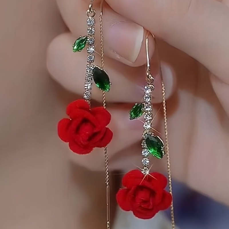 Orecchini infilabili a forma di rosa rossa con stelo di cristallo
