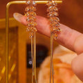 Elegante oorbellen met tarwekwasten
