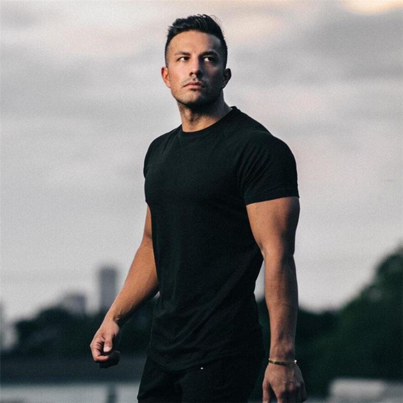 T-shirt traspirante da fitness da uomo, modello muscoloso
