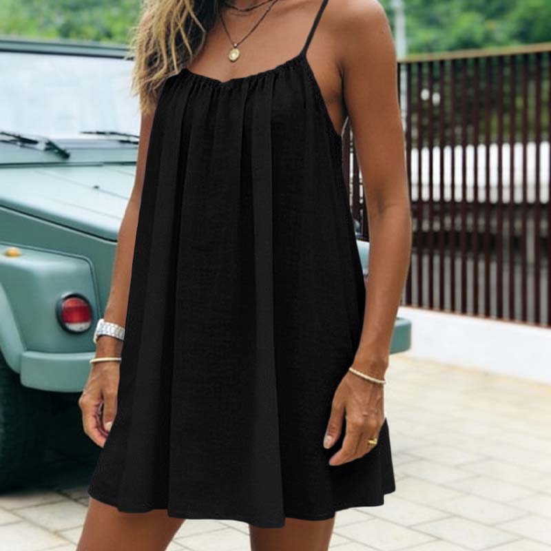Zomerse mini-jurk met open rug en spaghettibandjes
