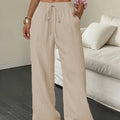 Pantalones de pierna ancha para mujer, de color liso y efecto arrugado