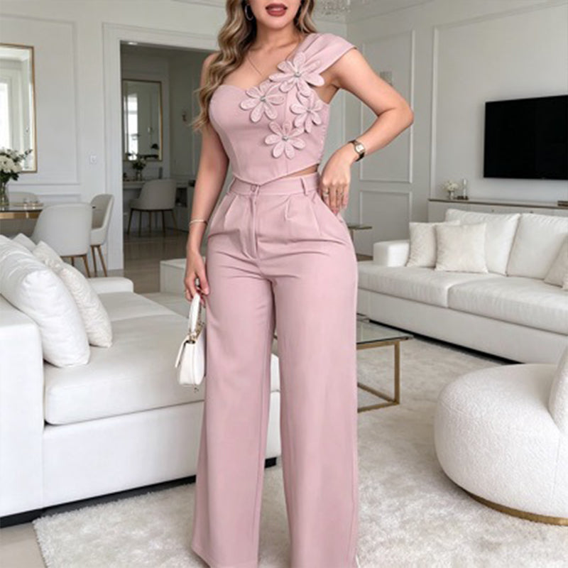 Conjunto elegante de top floral de un hombro y pantalones de pierna ancha