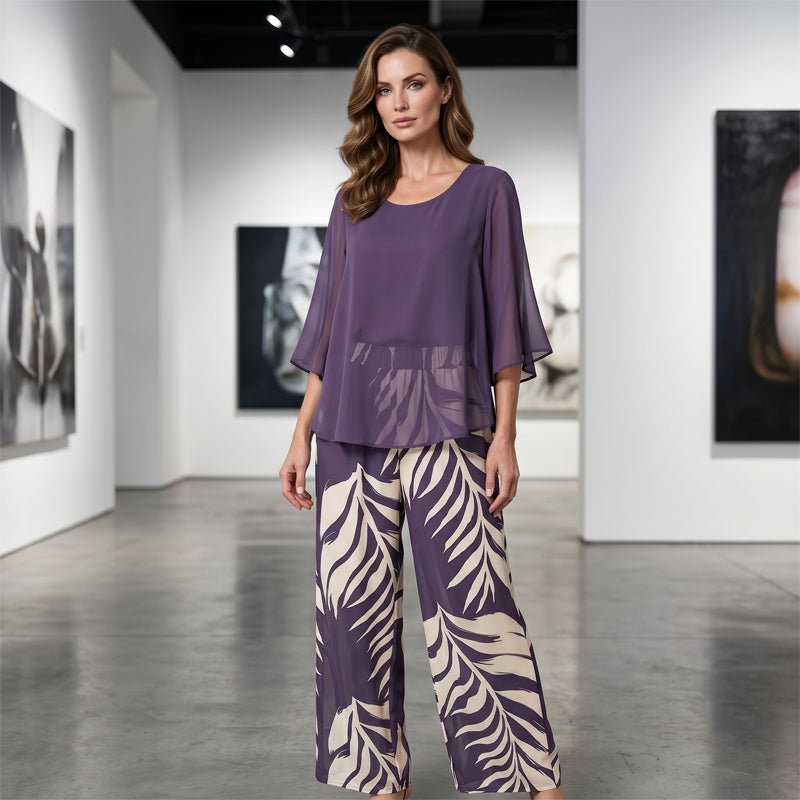 Conjunto elegante de top fluido y pantalones estampados para mujer