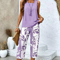 Completo con top senza maniche e pantaloni capri stampati