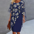 Conjunto elegante de mujer con sobrefalda y vestido de estampado floral