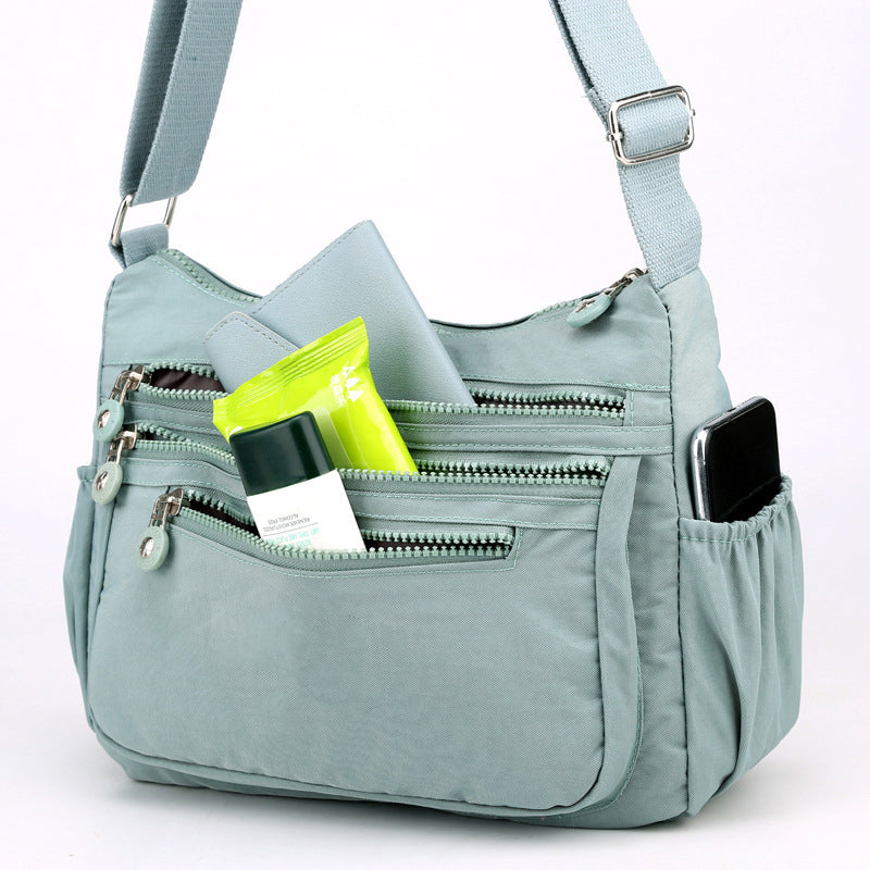 Bolso bandolera ligero de nailon con múltiples bolsillos