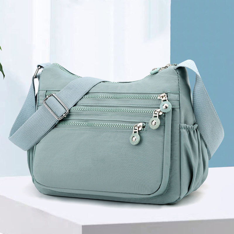 Bolso bandolera ligero de nailon con múltiples bolsillos