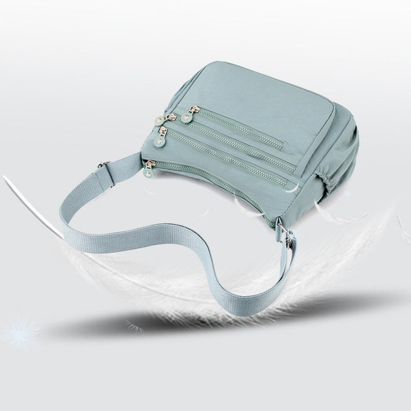 Bolso bandolera ligero de nailon con múltiples bolsillos
