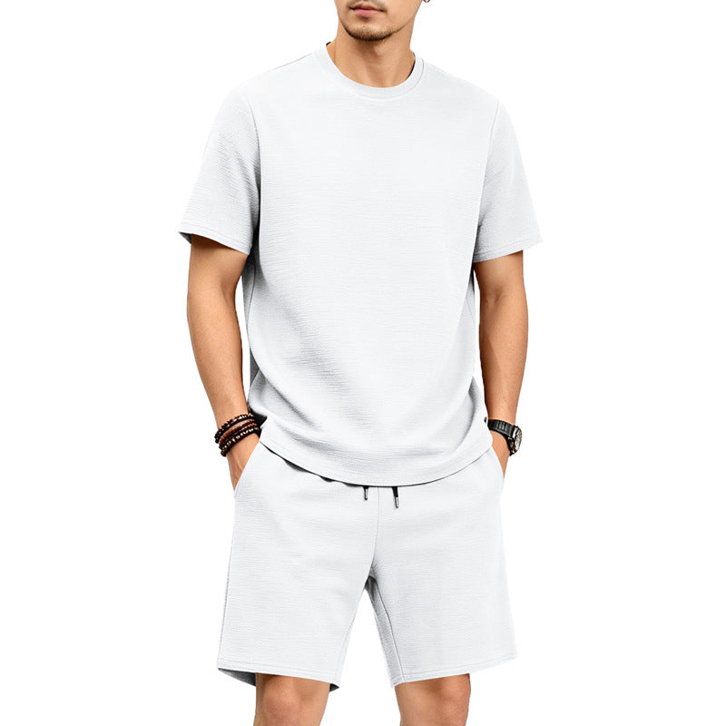 Conjunto de camiseta de cuello redondo de manga corta y color liso para hombre