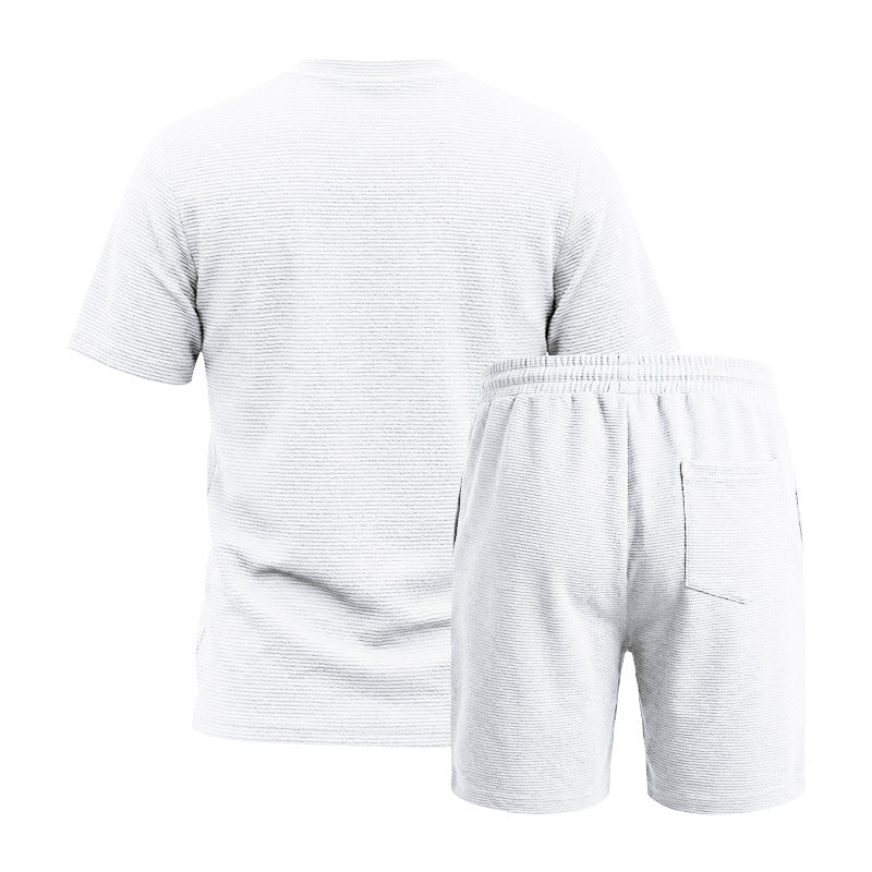 Conjunto de camiseta de cuello redondo de manga corta y color liso para hombre