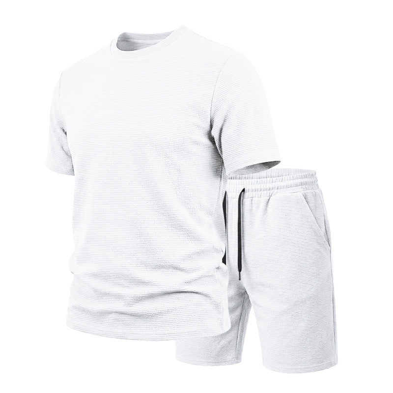Conjunto de camiseta de cuello redondo de manga corta y color liso para hombre