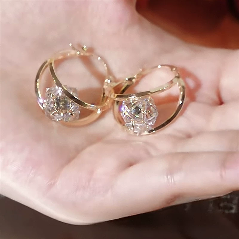 Pendientes de doble aro con bolas de zirconia brillantes