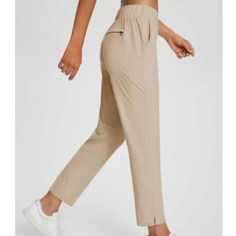 Pantalon taille haute à poches zippées ¨C ventre plat et extensible respirant