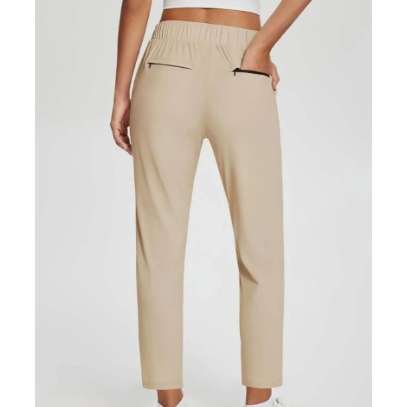 Pantalon taille haute à poches zippées ¨C ventre plat et extensible respirant