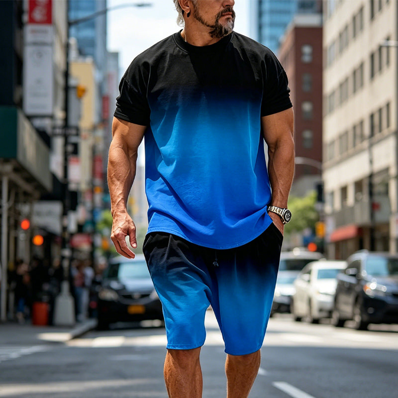 Completo da uomo con maglietta e shorts con stampa sfumata