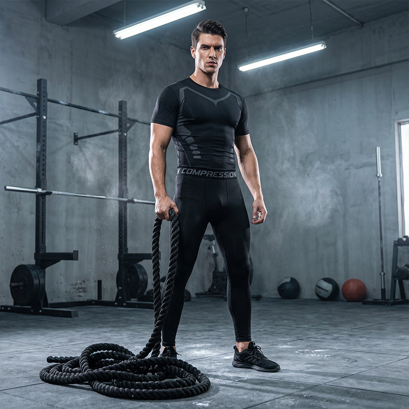 Conjunto de camiseta y pantalones de compresión para hombre de secado rápido