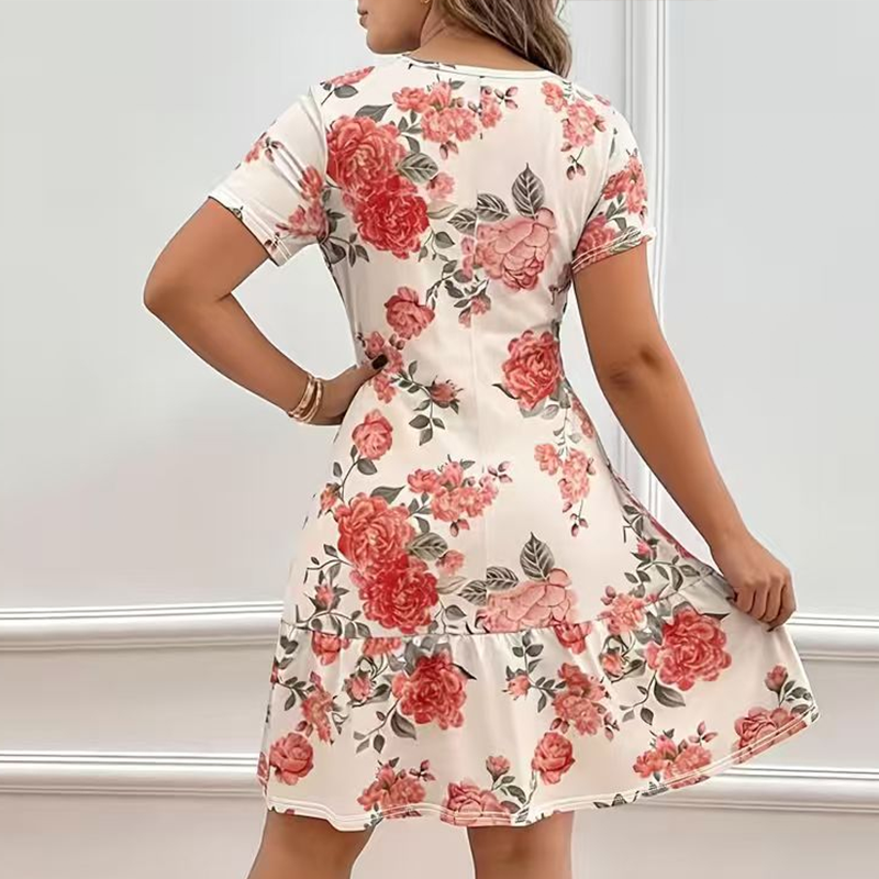 Elegante jurk voor dames met bloemenprint en ruches aan de zoom