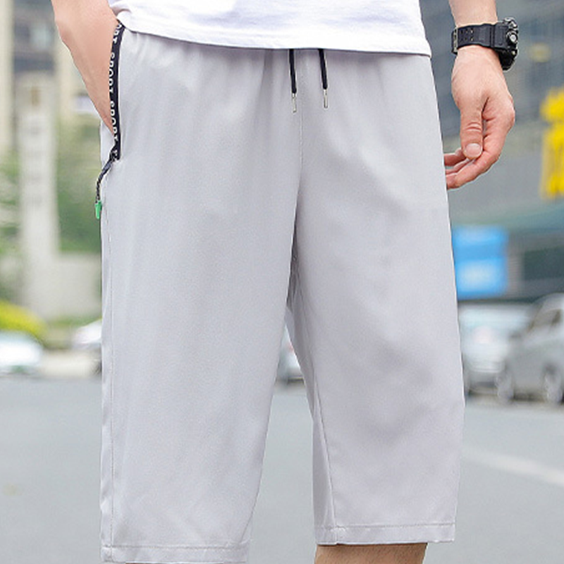 Pantaloni sportivi da uomo leggeri, ad asciugatura rapida e a gamba corta