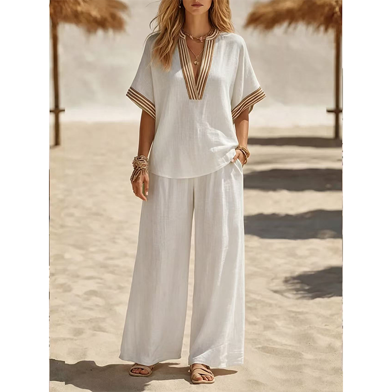 Completo da donna con top con scollo a V e pantaloni a gamba larga