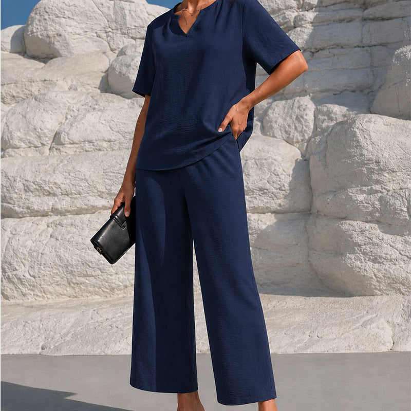 Completo da donna con top con scollo a V e pantaloni a gamba larga