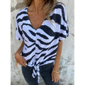 T-shirt voor dames met V-hals, strik aan de voorkant en zebraprint