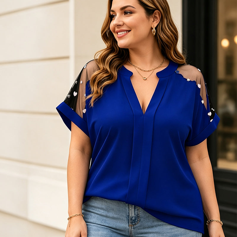 Damesblouse met grotere maat, transparant mesh en V-hals