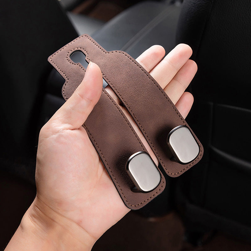 Gratis haak/kleerhanger voor de achterkant van de autostoel