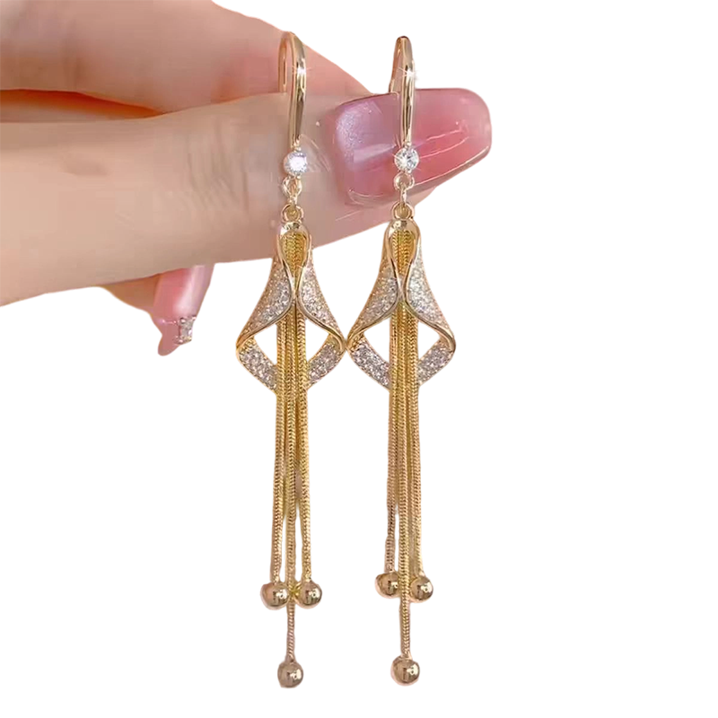 Elegante geometrische oorhangers met kwastjes
